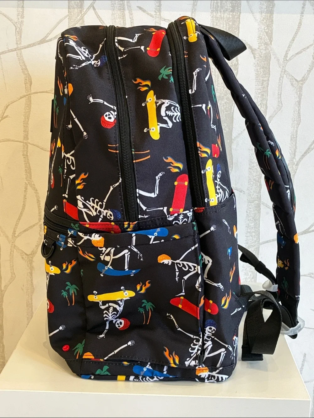 STATE Black Backpack with Multicolor Skate Skeleton Print